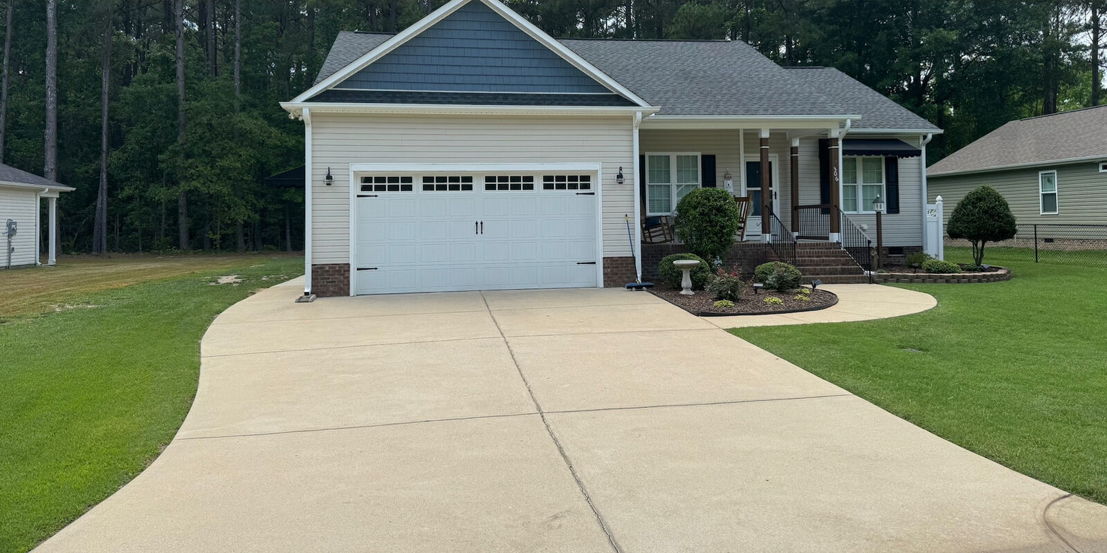 Driveway before pressure washing